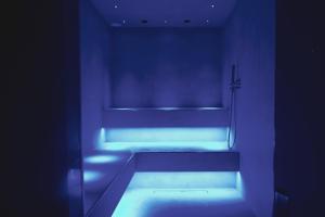 Voodi või voodid majutusasutuse Moma Hotel Wellness & Spa toas