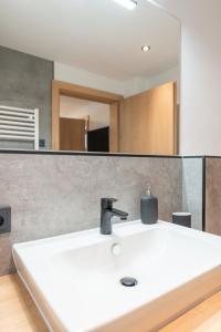 Koupelna v ubytování Apartment Foidl + 16 fotografií