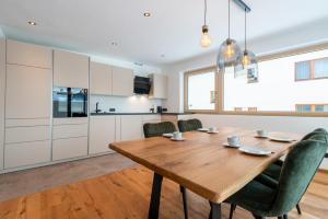 Kuchyň nebo kuchyňský kout v ubytování Apartment Foidl