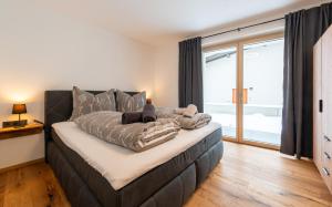 Postel nebo postele na pokoji v ubytování Apartment Foidl