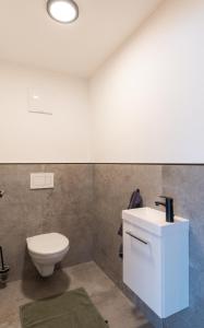 Koupelna v ubytování Apartment Foidl