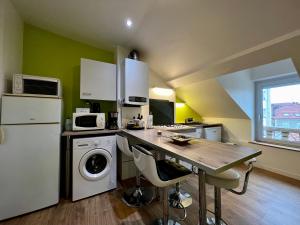 Køkken eller tekøkken på Esprit Cocooning / Secteur centre / Netflix + 21 billeder