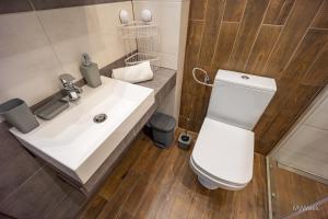 Koupelna v ubytování Apartament Habel, MyWeek + 9 fotografií