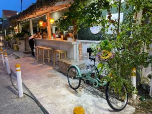 a bike parked in front of a restaurant at Hotel DUCASSI SOL CARIBE in Punta Cana