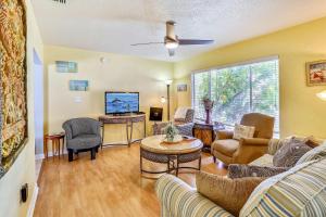 a living room with a couch and a table at C7-Dolphin in St Pete Beach