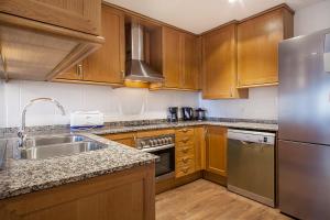 Kuchyňa alebo kuchynka v ubytovaní Suites4days Provenza Apartment + 4 fotografie