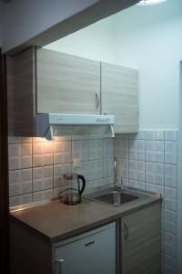 A kitchen or kitchenette at Musses House