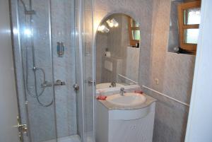 Koupelna v ubytování PAGA Hotel