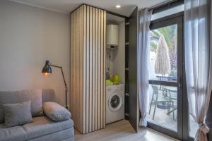 A seating area at The Little Jewel with Ocean View - Las Americas