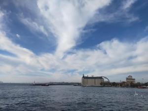 a large body of water with a cloudy sky at An Easy Transport and Quiet Apartment in Istanbul in Istanbul