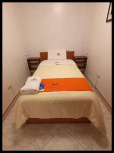 Postel nebo postele na pokoji v ubytování Sumaq Dreams Ayacucho