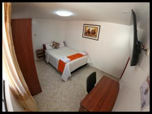 Postel nebo postele na pokoji v ubytování Sumaq Dreams Ayacucho