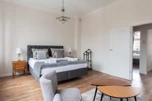 Łóżko lub łóżka w pokoju w obiekcie Olives Marina Apartment Gdańsk