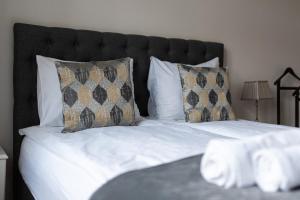 Łóżko lub łóżka w pokoju w obiekcie Olives Marina Apartment Gdańsk