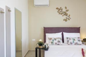 A bed or beds in a room at Villa Zoe , south Crete , Triopetra