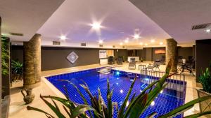 Бассейн в Motto Premium Hotel&Spa или поблизости
