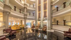 Гостиная зона в Motto Premium Hotel&Spa
