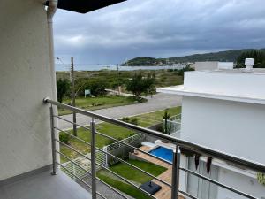 Vaizdas į baseiną apgyvendinimo įstaigoje Apart-Hotel "Encantos do Mar" - Beira Mar arba netoliese