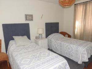 Postel nebo postele na pokoji v ubytování Casa con vistas a la Bahía de Cádiz