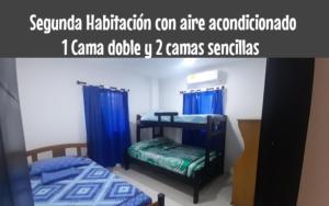 Postel nebo postele na pokoji v ubytování Apartamento JHON