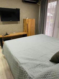Postel nebo postele na pokoji v ubytování Rtanjska kućica
