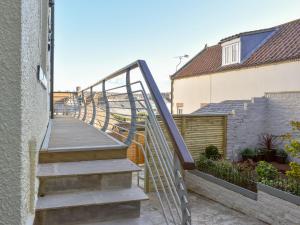 a stairway leading up to a house at Caedmons Dream in Whitby