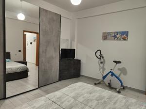 Posteľ alebo postele v izbe v ubytovaní Casa Trezza