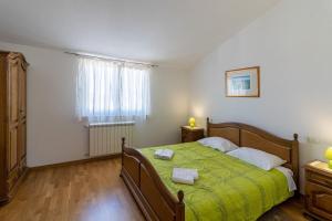 Posteľ alebo postele v izbe v ubytovaní Villa Lavanda