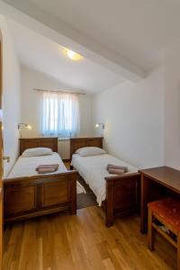 Posteľ alebo postele v izbe v ubytovaní Villa Lavanda