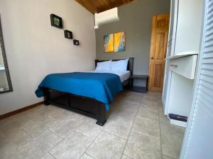 Ein Bett oder Betten in einem Zimmer der Unterkunft Casa Camino Luna Private Rooms