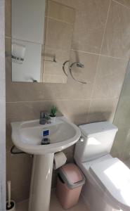 Koupelna v ubytování Aparta Hotel Cisne