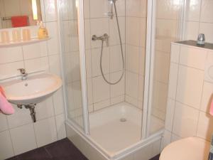 Koupelna v ubytování Hotel am Hindenburgplatz