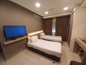 Postel nebo postele na pokoji v ubytování Lujain Hotel فندق النور واللجين