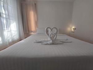 Postel nebo postele na pokoji v ubytování White house bailan resort