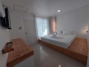 Postel nebo postele na pokoji v ubytování White house bailan resort