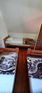 Postelja oz. postelje v sobi nastanitve Katun Mokra accommodation & horseback riding