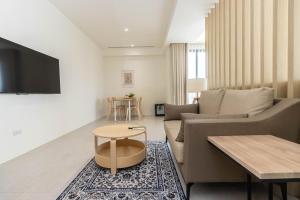 TV a/nebo společenská místnost v ubytování DOME Homestay