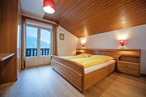 Ένα ή περισσότερα κρεβάτια σε δωμάτιο στο Apartments Karl