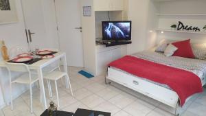 Ένα ή περισσότερα κρεβάτια σε δωμάτιο στο StudioBeach