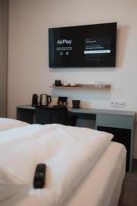 Posteľ alebo postele v izbe v ubytovaní City Rooms Amstetten