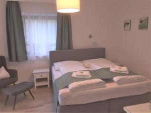Postel nebo postele na pokoji v ubytování Gästewohnung Schlossblick
