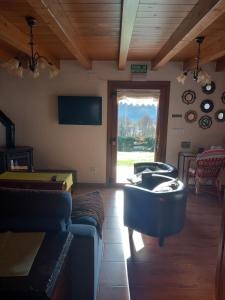 Et tv og/eller underholdning på Casa de Aldea El Mirador de Villaverde