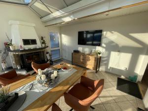 Μια τηλεόραση ή/και κέντρο ψυχαγωγίας στο Unser Ferienhaus im Harz