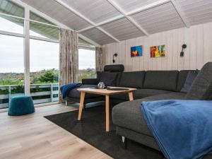 A seating area at 6 person holiday home in Ebeltoft