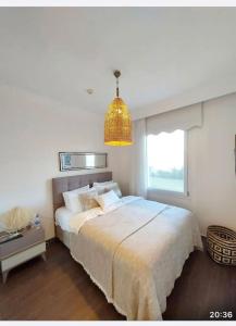 Postel nebo postele na pokoji v ubytování Bodrum Sianji 7 Yıldız otel Vip Bahçeli Residance