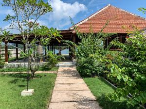 Zahrada ubytování The Club Villas Lombok