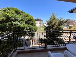 a balcony with a view of a building at Studio SeaDream in Primorsko +11 photos
