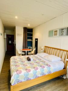 Letto o letti in una camera di Apt 204, Vue Mer, Accès plage Trestraou, Perros-Guirec