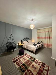 Postel nebo postele na pokoji v ubytování Euphoria guest house