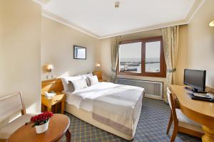 Postel nebo postele na pokoji v ubytování Sidonya Hotel + 37 fotografií